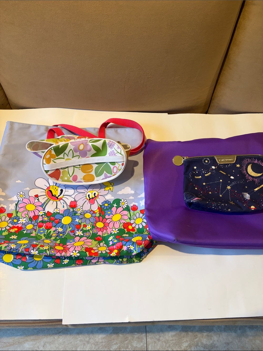 Bundle of 2 totes with smaller cosmetic bags.